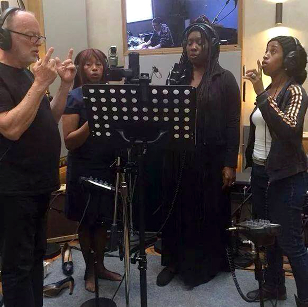 Pink Floyd's Dave Gilmour with Durga McBroom-Hudson (second from right) and backing vocalists in the studio